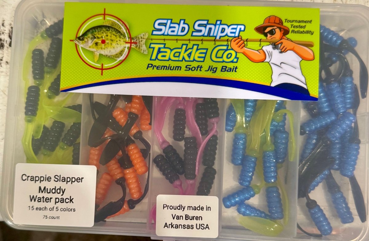Small plastic box with different colors of crappie jigs of orange, green, blue, and black. Slab sniper logo on the lid